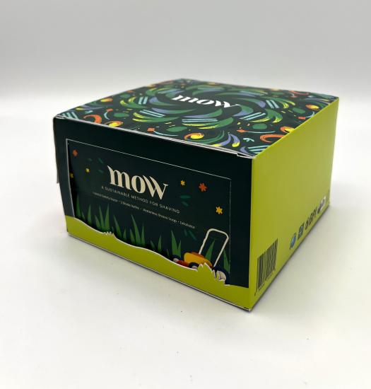 A paperboard package containing green print with text that reads: mow