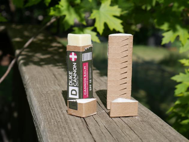A triangular lip balm made out of paperboard